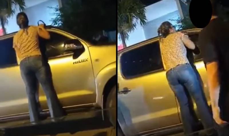 Video de mujer que se cuelga en camioneta para bajar a la amante de su pareja.